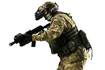 Fototapeta premium Soldier in full camouflage gear aiming weapon in isolated studio backdrop