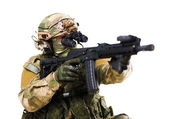 Fototapeta premium Camouflaged Soldier Aiming with Tactical Equipment and Firearm Showing Readiness