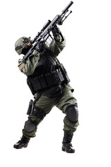Tactical soldier aiming a rifle in action wearing protective gear and uniform