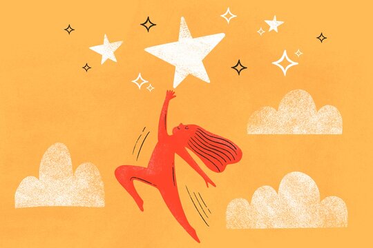 A girl jumping up to reach a star