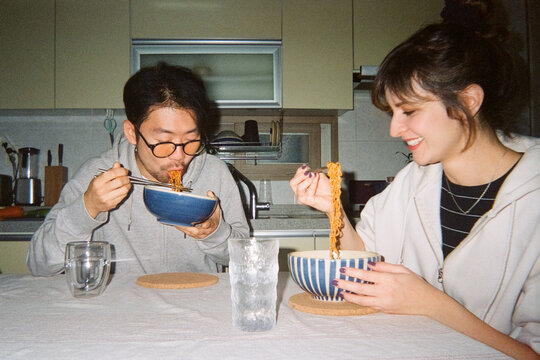 Eating noodles