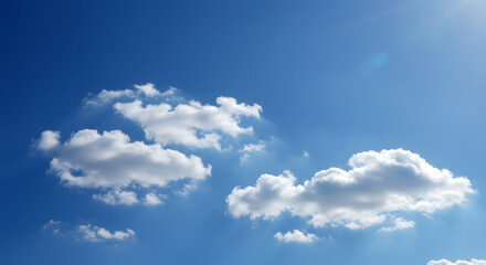 Azure Serenity: A vast expanse of azure sky, punctuated by fluffy white clouds, embodies tranquility and hope. The sun peeks through, casting a warm glow on the picturesque scene.