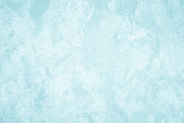 Pastel blue and white concrete stone texture for background in summer wallpaper. Cement and sand wall of tone vintage. Concrete abstract wall of light cyan color, cement texture mint green for design.