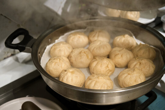 Closeup of steamed buns in the steamer