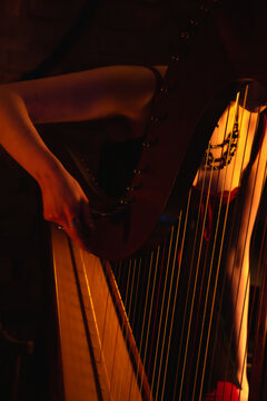 close up of harp being moved onto stage