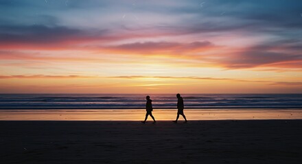Beach Walk at Sunset: Silhouetted Figures on the Shore