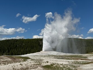 Old Faithful Geyser Eruption at Yellowstone National Park 