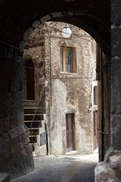 Historic Stone Alleyway Framed by an Arch