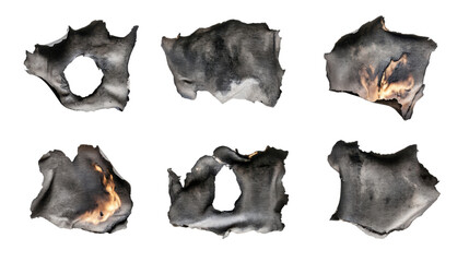 Fototapeta premium collection of burnt holes in piece of paper on white background