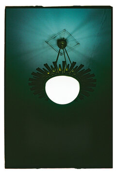Unique ceiling light fixture casts a soft glow in a Moscow metro