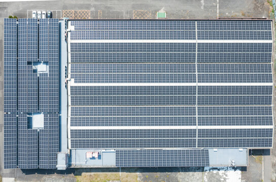 Aerial View of Commercial Building with Rooftop Solar Array