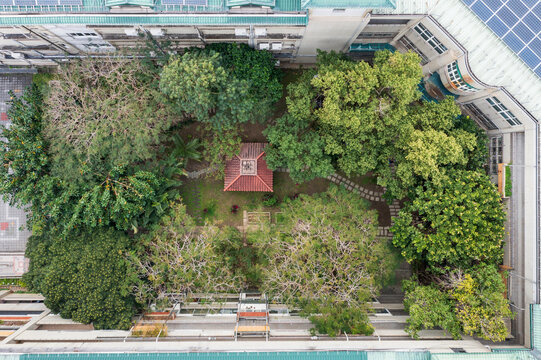 Aerial View of Serene Garden with Pavilion and Pathways