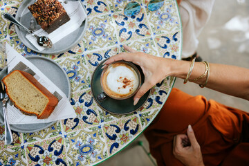 Cafeteria ambiance with coffee and pastry on a vibrant table
