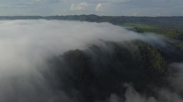 Fly above the clouds in sunrise moment