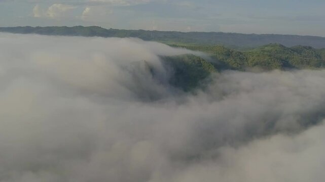 Fly above the clouds in sunrise moment