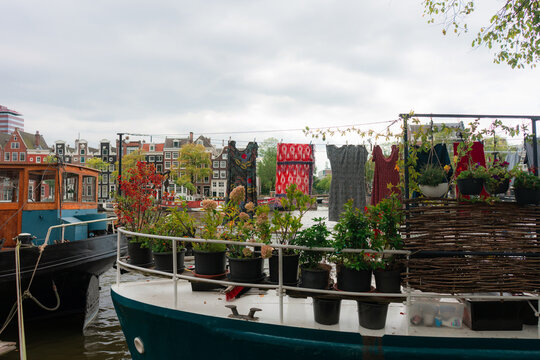Boat house on canal in Amsterdam, alternative lifestyle. Laundry