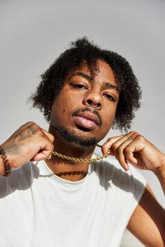 Cool black man with neck chain