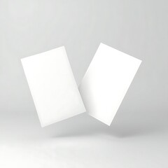 Two A4 flyers mockup floating at different angles in a white studio setup, perfect for showcasing front and back designs