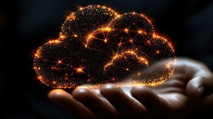 Glowing cloud network held in hand over dark background