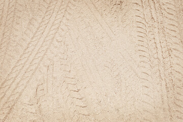 tire tracks in the sand abstract texture background