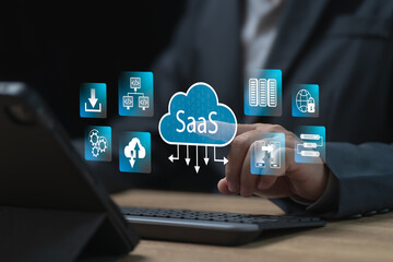 SaaS, Software as a Service for business, Internet data storage business concept, Businessman use tablets technology software to store data securely,  Modern technology platforms and cloud computing