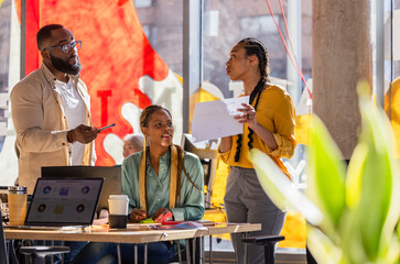 Colleagues Collaborating in a Modern Office Environment