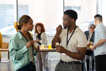 Colleagues Enjoying Snacks and Conversations at a Seminar