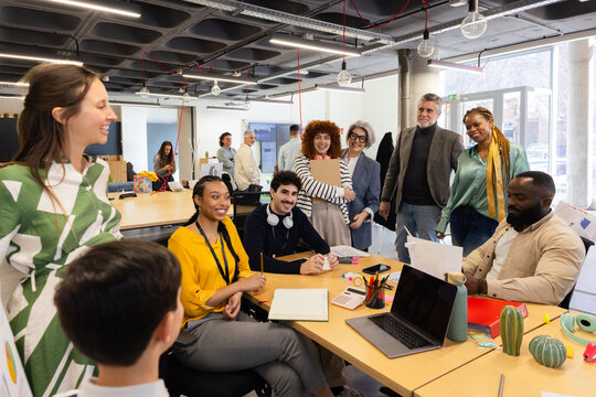 Diverse team collaborating in a modern office setting