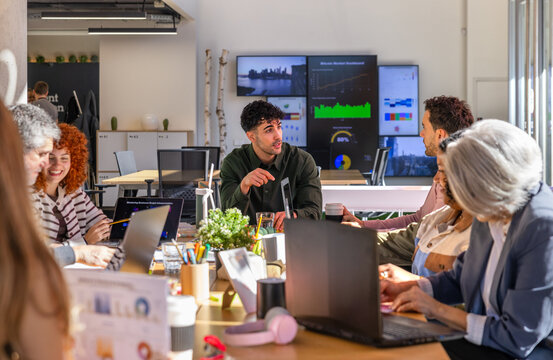 Collaborative business meeting with diverse team in office