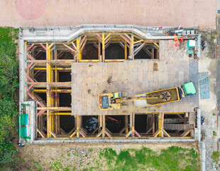 Aerial View of Steel Structure Construction with Machinery