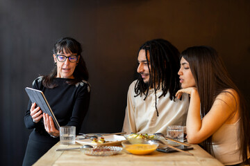 Couple discussing wedding menu with wedding planner 