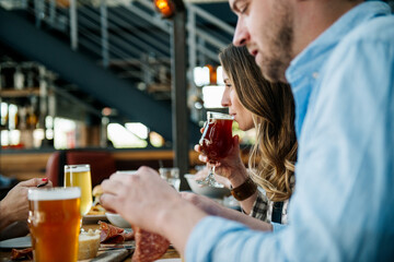 Woman tasting her beer