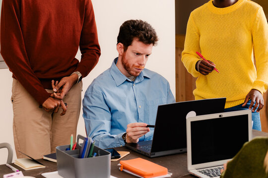 Professional examines and provides input on the work of his coworkers