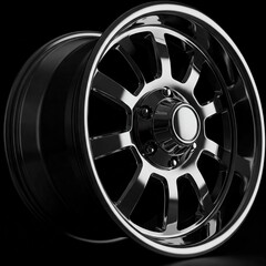 Obraz premium shiny chrome wheel with black background closeup of rim detail 3d rendering