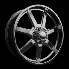 Obraz premium chrome alloy wheel rim on black background studio shot