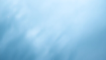 Light blue background with smooth texture and blurred edges