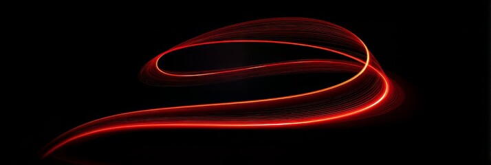 Abstract red light trails form dynamic lines on a dark background, resembling neon energy and fast movement