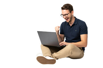 young man working on laptop raise fist high in celebration on transparent
