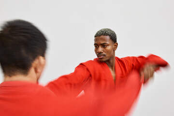 Mixed martial arts training session featuring skilled practition