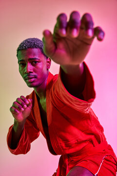 Training in mixed martial arts with intense focus and strength