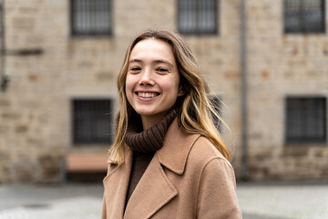 Young blonde woman smiling