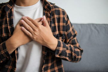 Cropped view of man put folded palms on chest feeling grateful and appreciation, express sincere feelings.