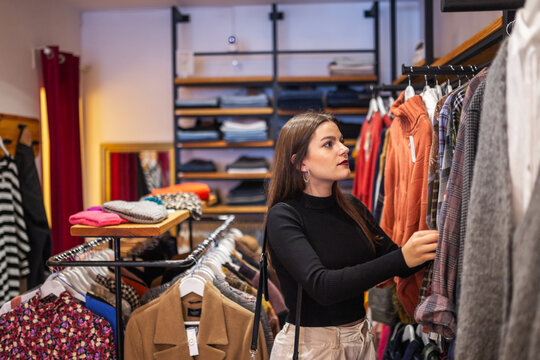 woman shopping in a clothing store