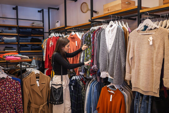 woman shopping in a clothing store