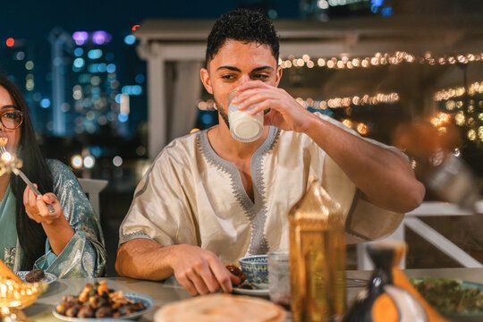 Ramadan Iftar man drinking Laban