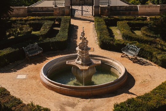 A fountain in a royal palace garden