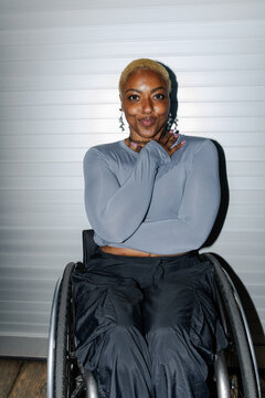 Confident Woman Posing in Wheelchair Highlighting Confidence