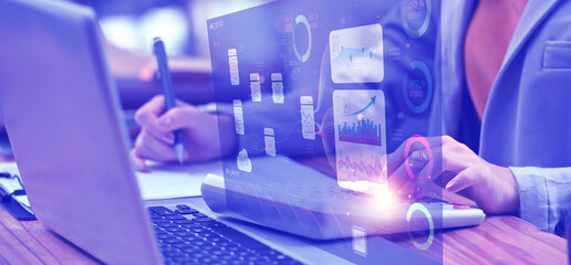 A close-up of a businessman's hands working on a laptop computer with data visualization overlaying the screen. The image suggests a combination of technical expertise and data-driven decision-making.