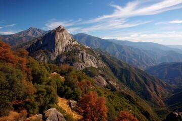 Fototapeta premium Majestic Moro Rock Nestled in Sequoia National Park, California: A Scenic Autumn Landscape Surrounded by Vibrant Foliage and Towering Mountains