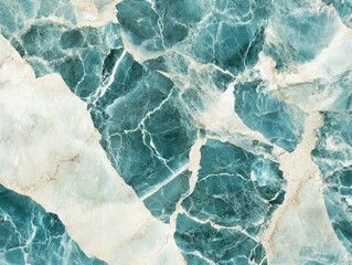 Obraz premium Close-up view of a teal and cream colored patterned stone surface.